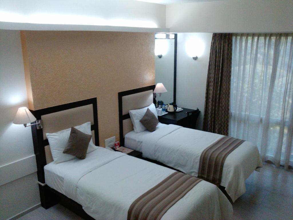 Pattom Royal Hotel Тривандрум Номер фото